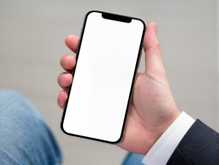 Hand Holding Smartphone With Blank Screen For Mockup, Modern Technology, Business Use, Close-Up Portrait. lose-up of a hand holding a smartphone with a blank white screen. Perfect for tech, business.