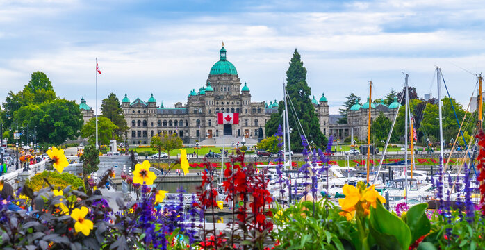 British columbia parliament buildings seen from the inner harbour during summer in victoria, canada