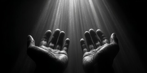 Human hands reaching out in faith and worship for religious background