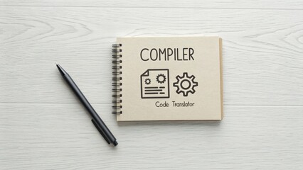 Compiler Icon on Notebook with Pen
