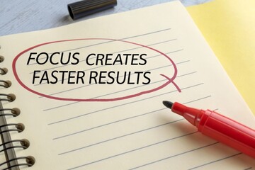Focus Creates Faster Results written on lined paper with a red marker emphasizing the message.