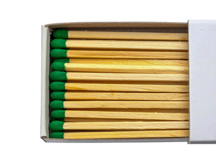 A box of wooden matches with green tips on transparent background