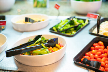 Various vegetable and fruit salad in salad bar shop