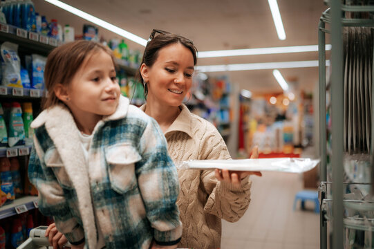 Mother and daughter shopping for everyday essentials