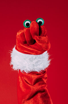 Festive Santa hand puppet for the holiday season