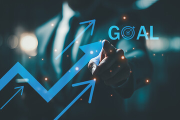 Businessman pointing toward goal, Business growth concept with rising arrows and goal achievement visualization.