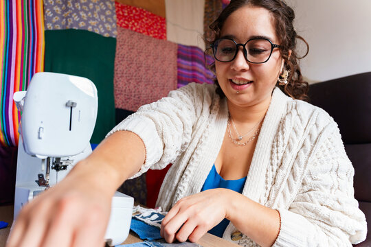 Chilean seamstress working in her colorful workshop