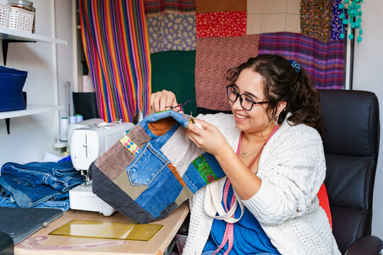 Chilean seamstress working on colorful patchwork design