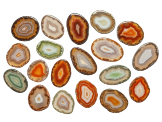 Isolated collection of colorful agate slices showing concentric bands, gemological specimens