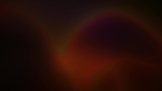 Smooth warm loop background gradient animation in dark brown and golden orange tones. Perfect for video projects, graphic design or wallpaper.