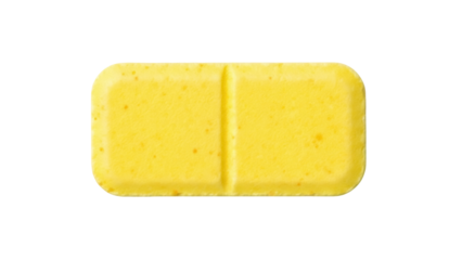 Isolated yellow tablet with a groove on it, pharmaceutical concept with no brand name
