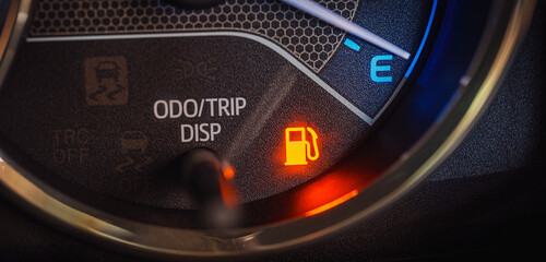 Low Fuel Warning Light on car Dashboard Display