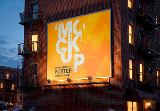 Billboard on brick building at dusk