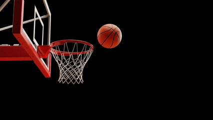 Orange basketball in mid air approaching red basketball hoop and net image