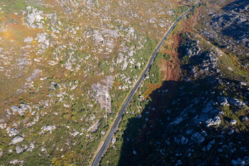 Mountain road winding through rocky terrain The Concept of Journey