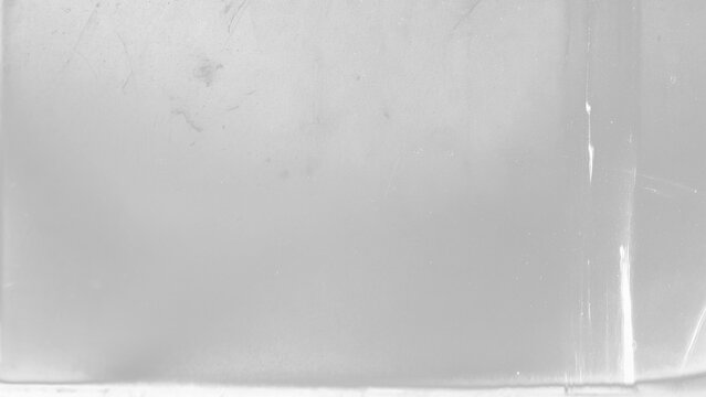 Dusty scratched scanned old film texture. Damaged grain. Overlay effect background image