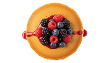 Isolated pancake stack topped with mixed berries and a drizzle of syrup for healthy breakfast