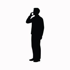 Person silhouette talking on phone while standing