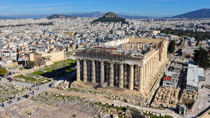 Fototapeta premium Aerial drone photo of iconic Acropolis hill and the Parthenon, Athens historic centre, Attica, Greece