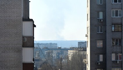 Modern building in the city at sunset, closeup of photo in a winter season