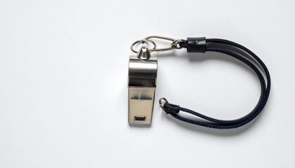 Metallic Silver Whistle with Black Braided Cord Against White Background