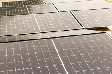 Modern rooftop solar panels generating clean renewable energy on a sunny day. Sustainable power technology for eco-friendly homes, green infrastructure, and environmental conservation