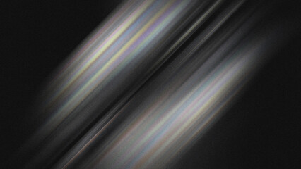 Vibrant rainbow light streaks shine brightly against a dark background, perfect for adding a touch of cosmic beauty to your project.