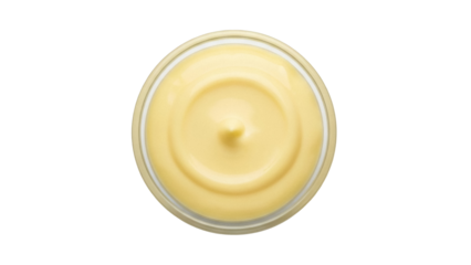 Isolated top-down view of golden cream in a transparent round jar for cosmetic or food use