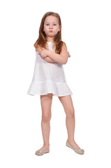 Sad little girl standing in a white dress
