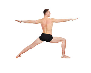 A muscular man doing a yoga asana.