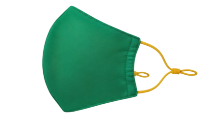 Isolated green face mask with yellow elastic straps, designed for protection & safety