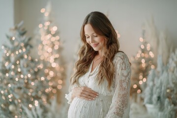 Smiling pregnant woman in beautiful Christmas dress. 