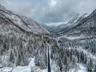 Winter magic in the Julian Alps. Lake Predil seen from above. Between snow and ice.
