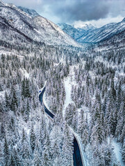 Winter magic in the Julian Alps. Lake Predil seen from above. Between snow and ice.