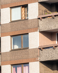 Bright and sunny day in a residential building with unique architectural details in an urban setting