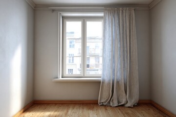 Light beige fabric panel covers one side of a bright rectangular window in an empty room