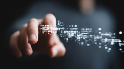 A finger interacts with a dynamic digital data stream, representing technology, connectivity and the future.