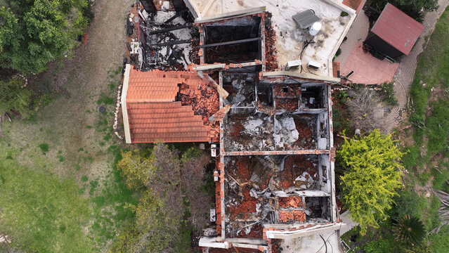 Aerial Destroyed Home in Kfar Aza 2023
Drone footage showing a heavily damaged residential house in Kfar Aza following the October 2023 attacks, Israel
