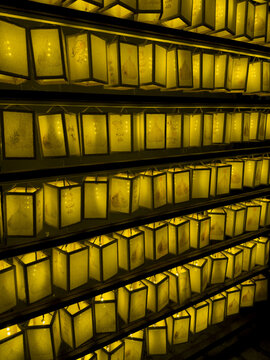 View of rows of glowing lanterns, each a beacon of soft yellow light, create a mesmerizing display of warmth and gentle illumination, Hoa Lư, Ninh B&igrave;nh, Vietnam.