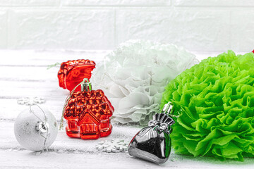 Traditional New Year composition. Festive decor, handmade paper flowers, gift idea. Holiday time