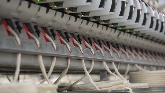 Industrial Textile Machine with Automated Yarn Feeders