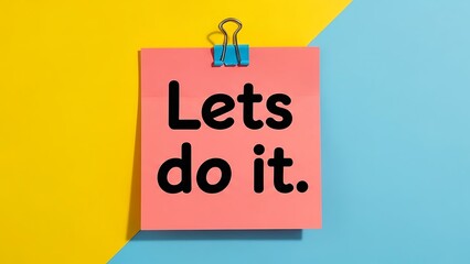 Motivational sticky note with bold black text saying lets do it against bright yellow and blue background