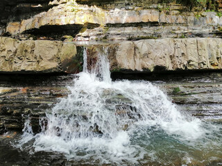 Waterfall in the Caucasus Mountains
