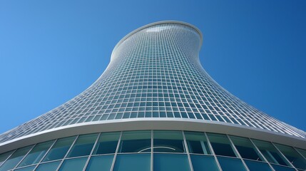 Minimalist urban design  a stunning view of modern skyscraper architecture against a clear sky
