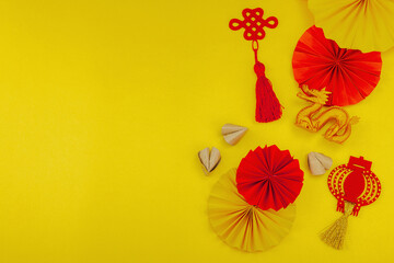 Happy Chinese New Year traditional concept. Oriental asian style paper fans on red background