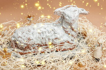 Christmas lamb cake with traditional New Year decor. Baked sweet dessert with sugar icing