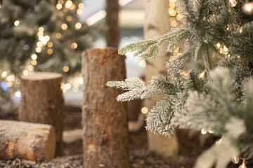 White Christmas tree with logs. new year concept