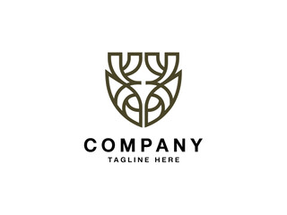 Obraz premium Modern Green Shield Company Logo Design with Tagline Space for Business Identity