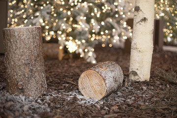 White Christmas tree with logs. new year concept