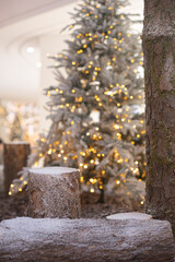 White Christmas tree with logs. new year concept